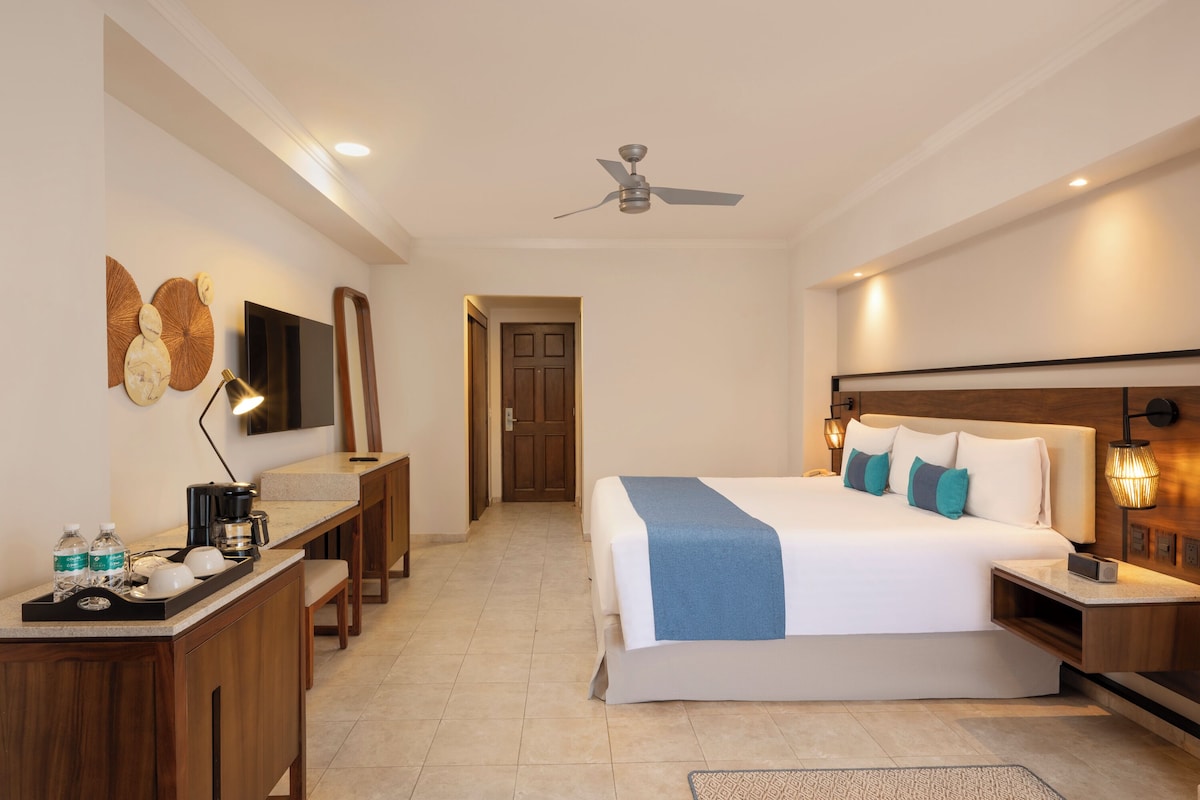 Habitación Deluxe con cama king en GR Solaris Cancún