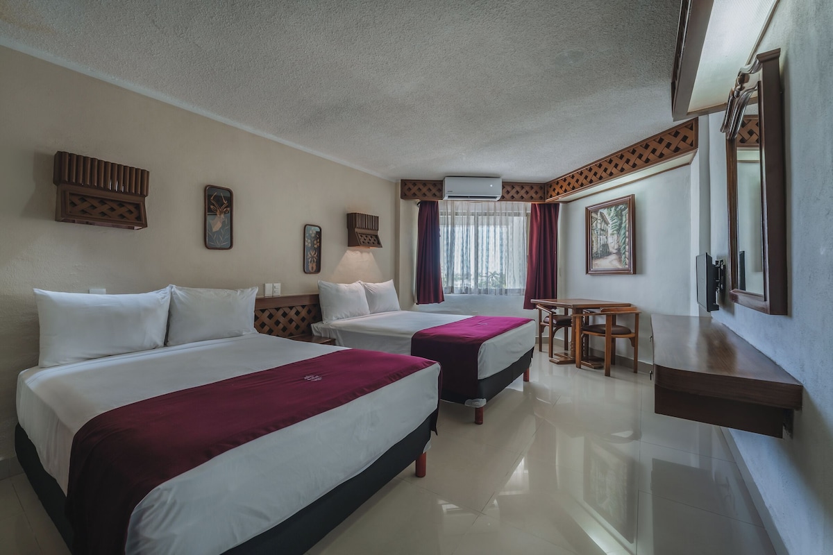 Habitación Standard Double con dos camas dobles en Hotel Plaza Kokai Cancún (hasta 4 personas)
